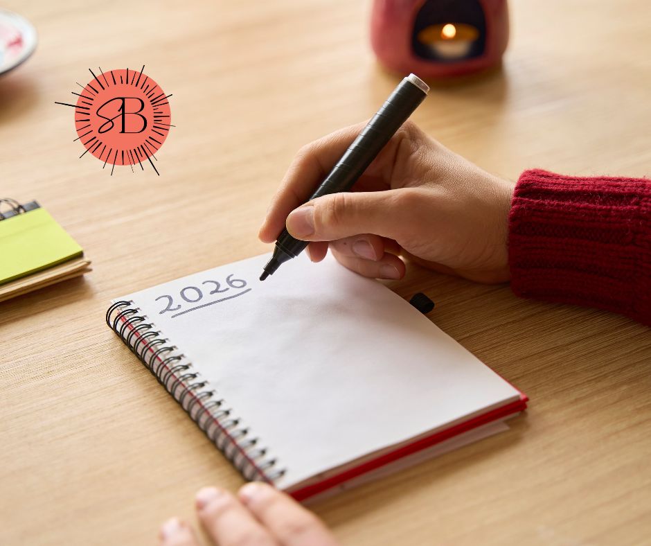 2026 Notepad with pen in hand