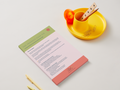 Product packaging with a pink and green design on a white background