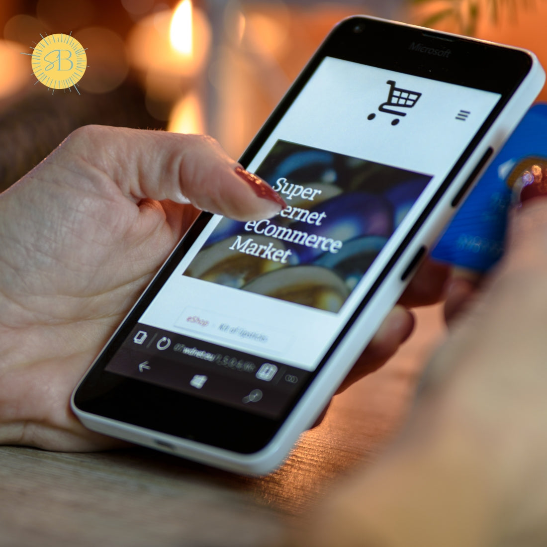 Person holding a smartphone with a shopping app open, blurred background